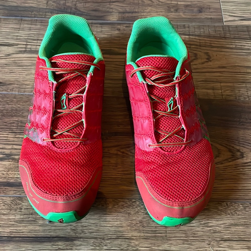 Red and green inov8 hare-xf 210